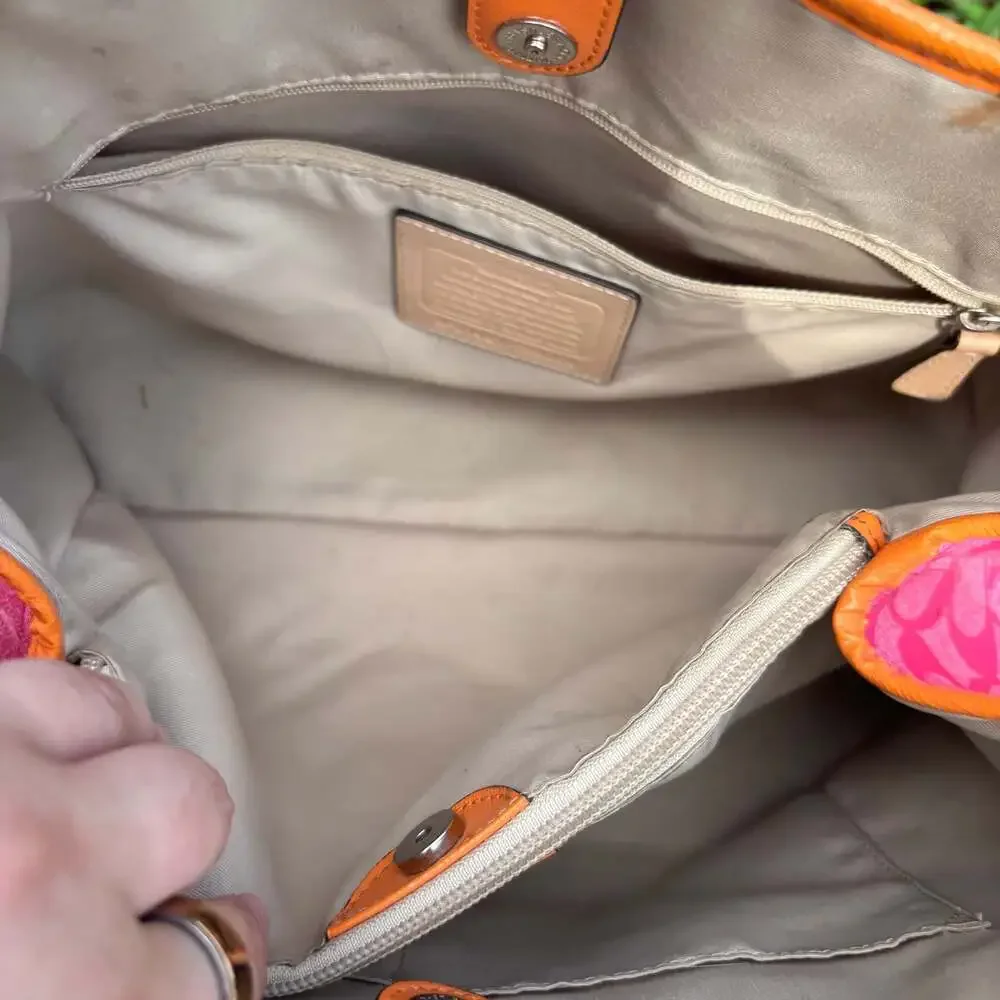 Coach Signature Canvas Drawstring Tote in Pink and Orange